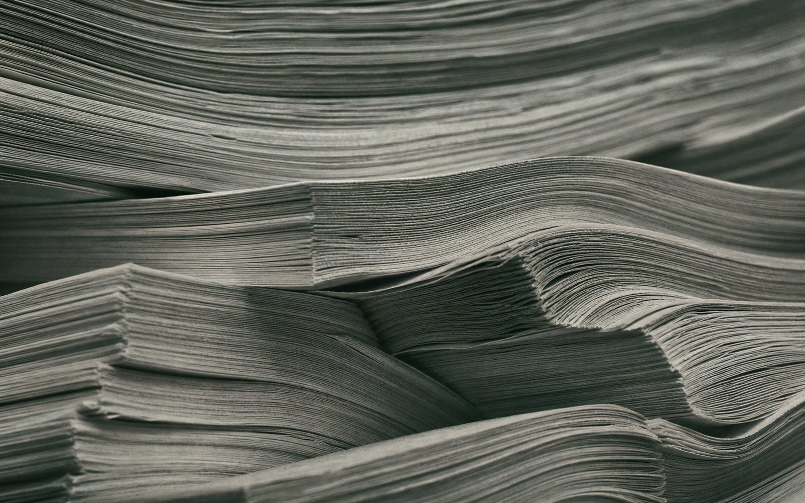 Macro of stacked document edges, an abstract topography of prior art